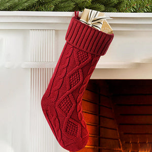 Weihnachtsstrümpfe - Der Weihnachtsmann legt Geschenke auf Socken